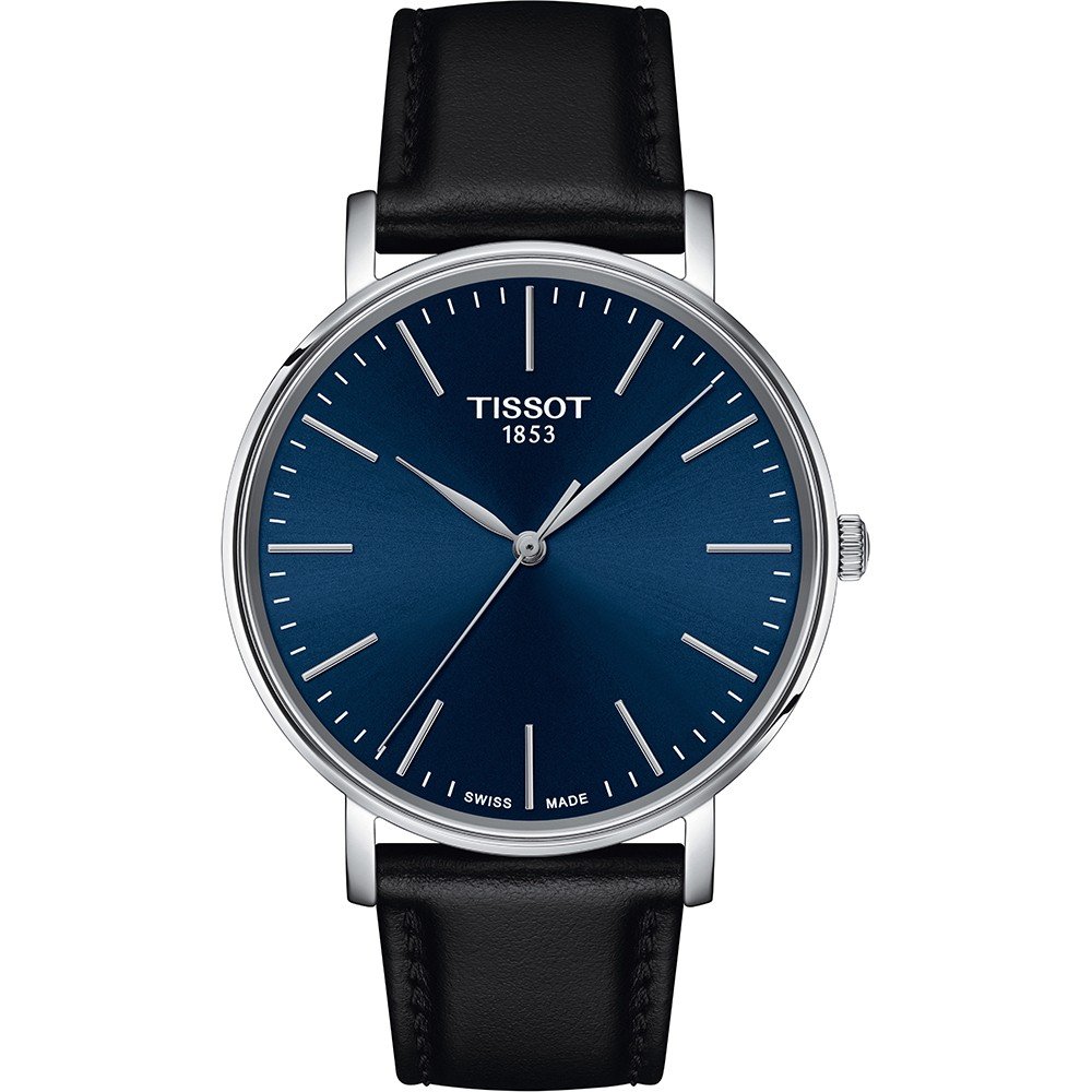 Montre Tissot avec un cadran bleu, boîtier en acier inoxydable et bracelet en cuir noir.