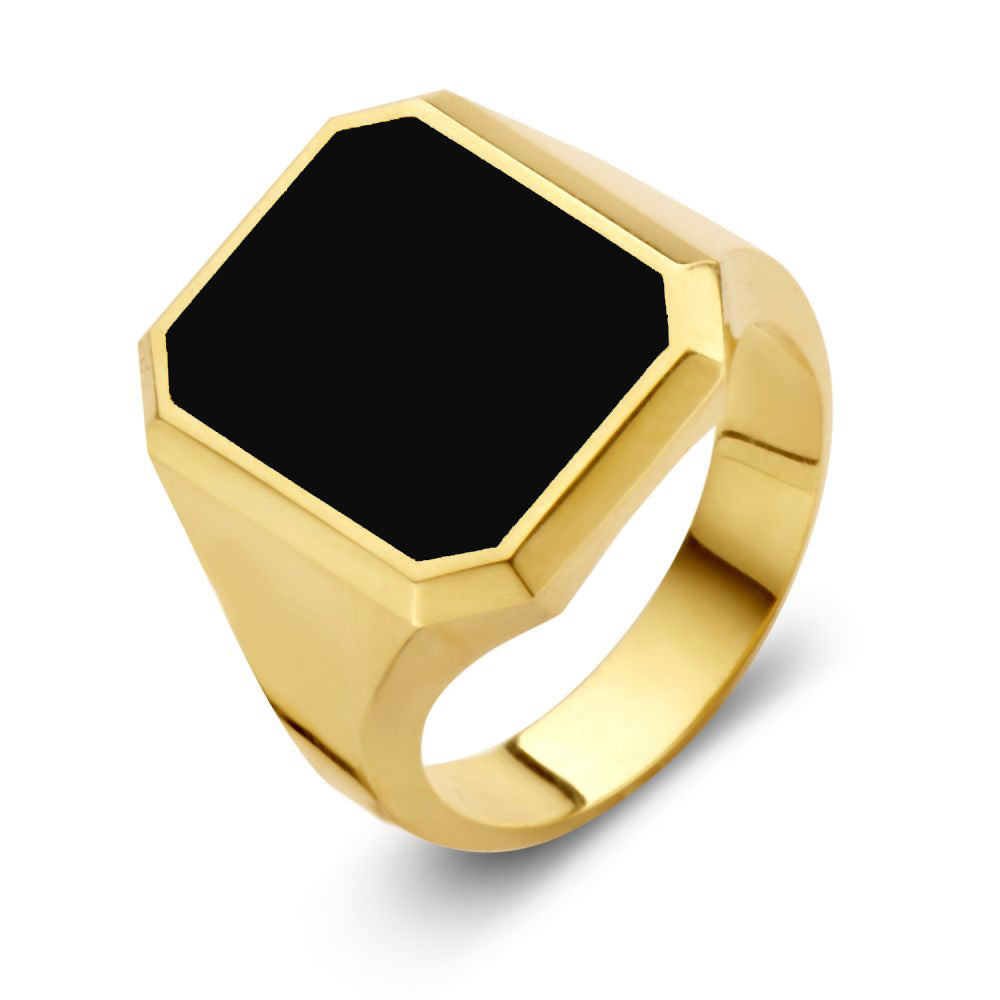 Bague en or jaune massif 14 carats avec pierre d'onyx noire, forme octogonale.