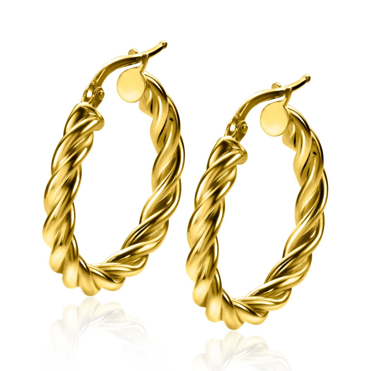 Boucles d'oreilles dorées en forme de créoles torsadées.