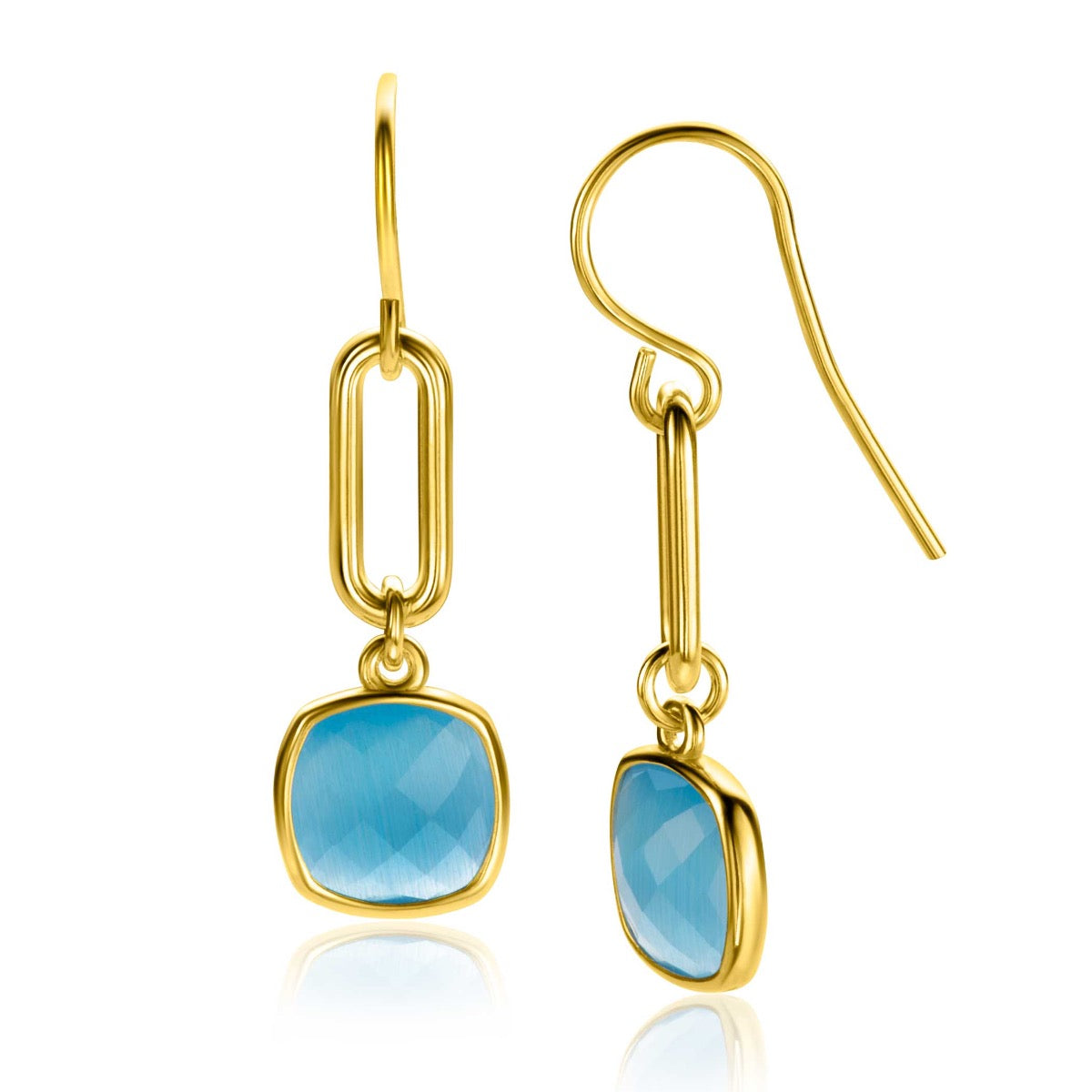 Boucles d'oreilles dorées avec un pendentif en pierre bleue facettée.