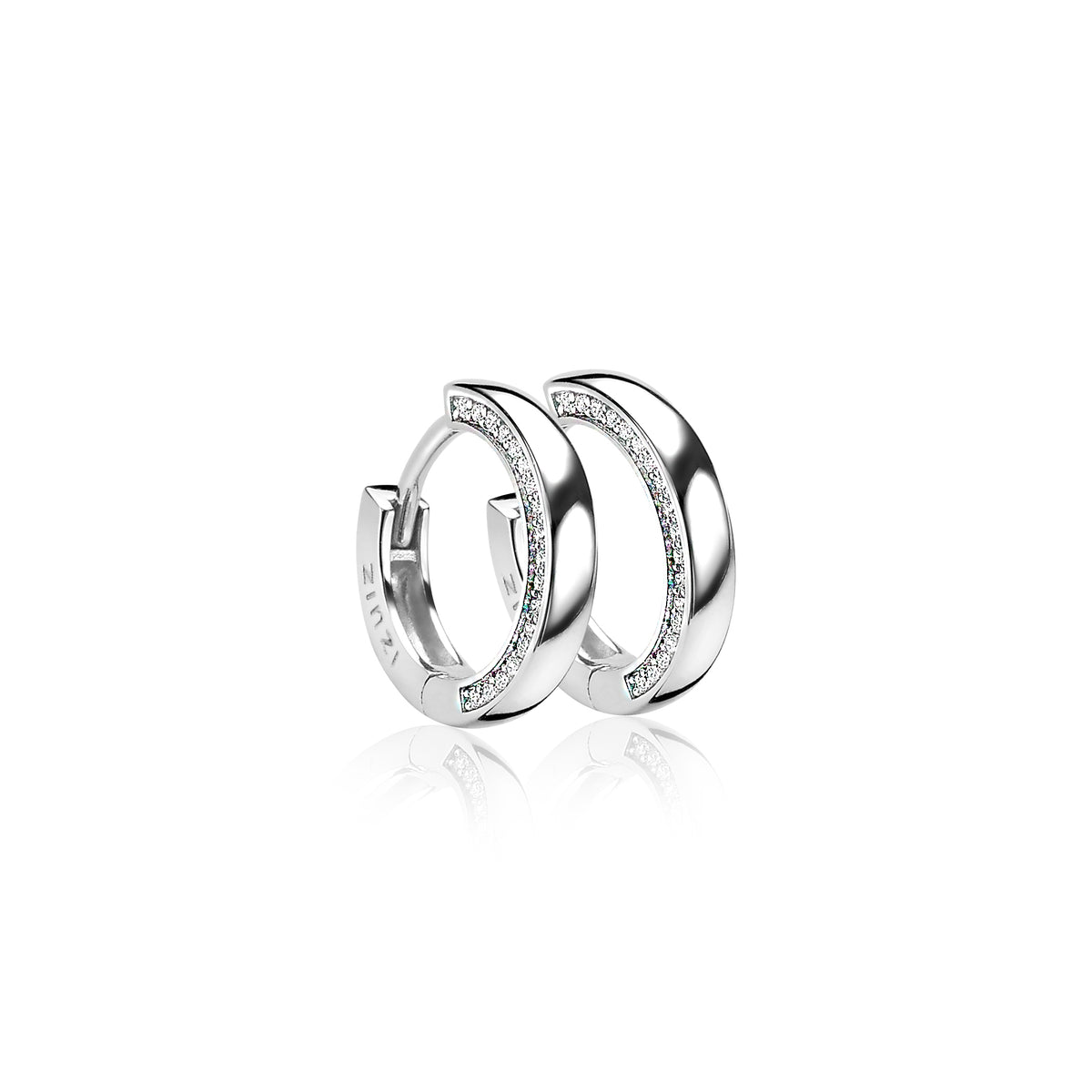 Boucles d'oreilles en argent avec des zircons, en forme de demi-lune.