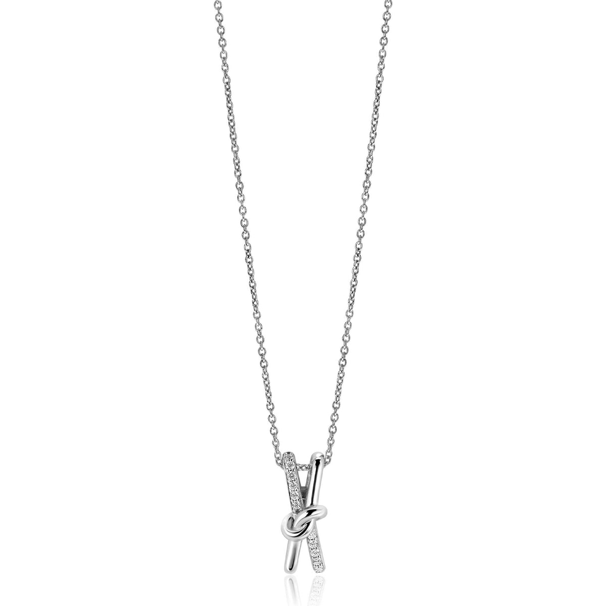 Collier en argent avec un pendentif en forme de nœud orné de zirconiums.