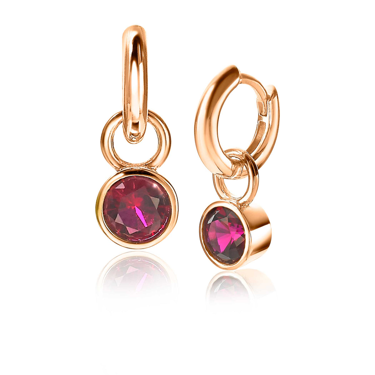 Boucles d'oreilles en plaqué or avec des pierres rondes rubis.