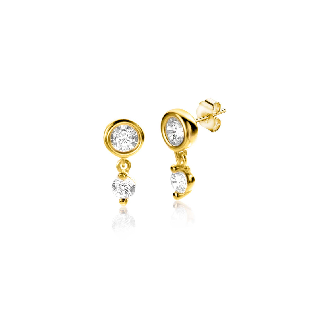 De elegante Zinzi Oorbellen Goud Zgo371 hebben een stekerontwerp waarbij elke oorbel is versierd met één kleine en één hangende ronde diamant in een ZINZI Gold-zetting, die het licht weerkaatst voor klassieke verfijning.