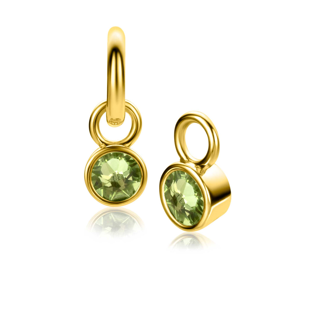 Boucles d'oreilles dorées avec un pendentif rond et une pierre verte.