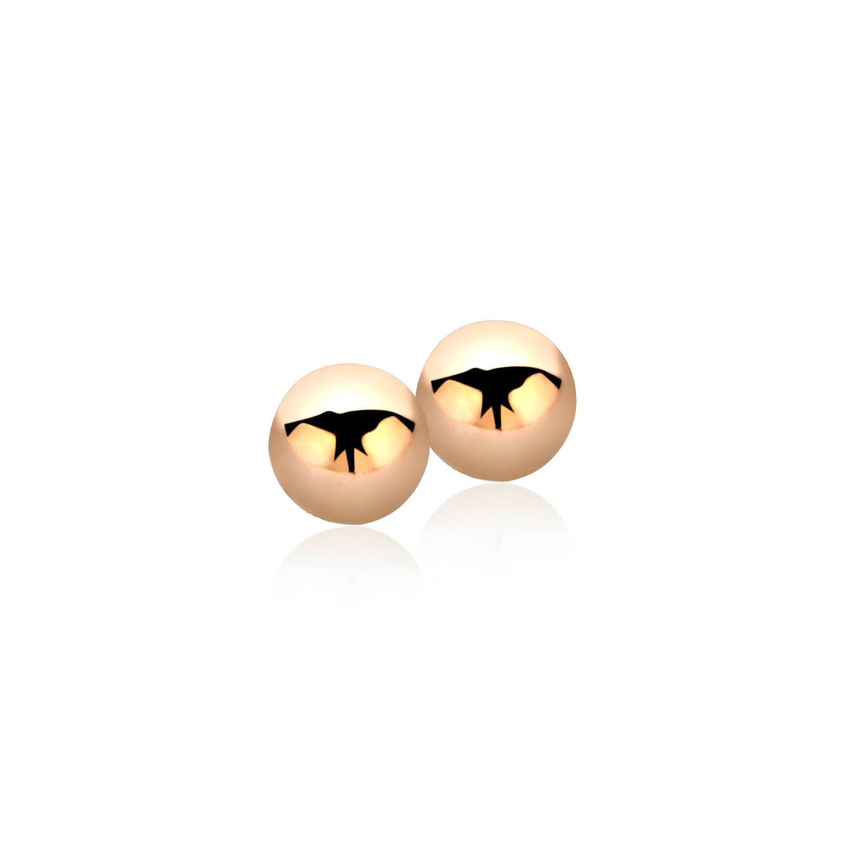 Boucles d'oreilles en plaqué or avec des sphères dorées et un motif noir.