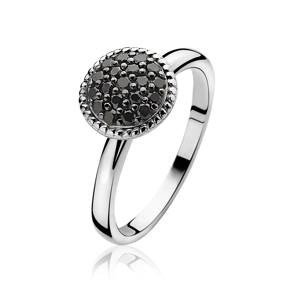 Bague en argent avec un motif rond en pierres noires.