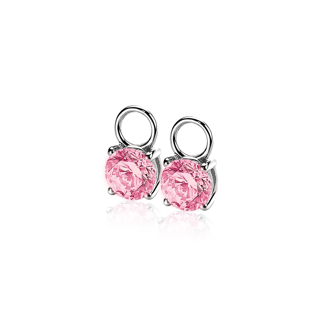 Boucles d'oreilles en argent avec des pierres roses en forme de rose.