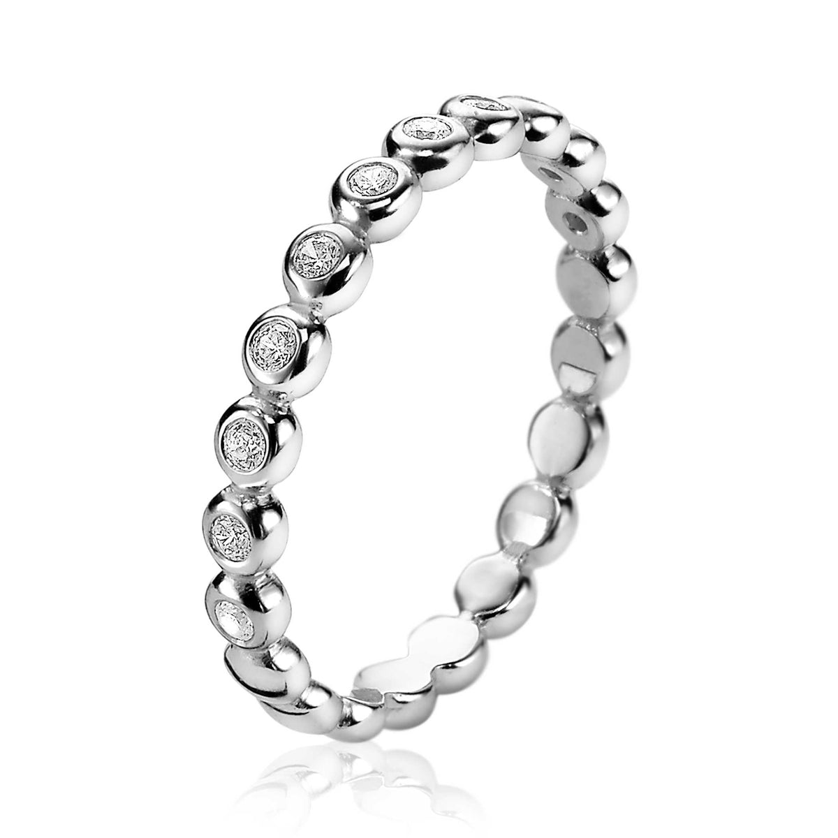 Bague en argent avec des détails en forme de petites pierres brillantes.