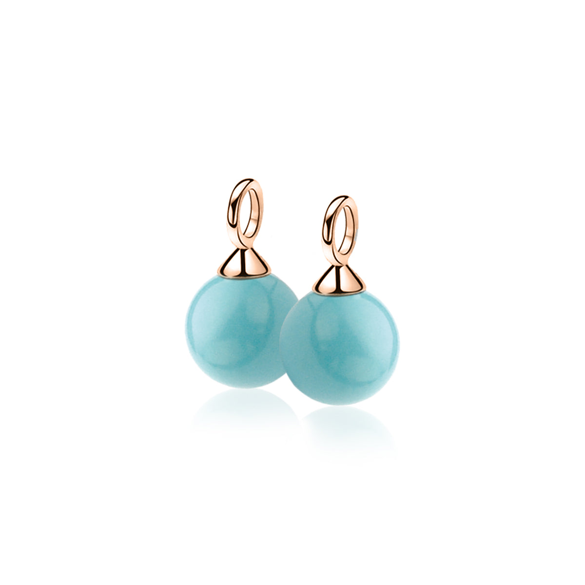 Boucles d'oreilles en plaqué or avec des perles turquoise rondes.
