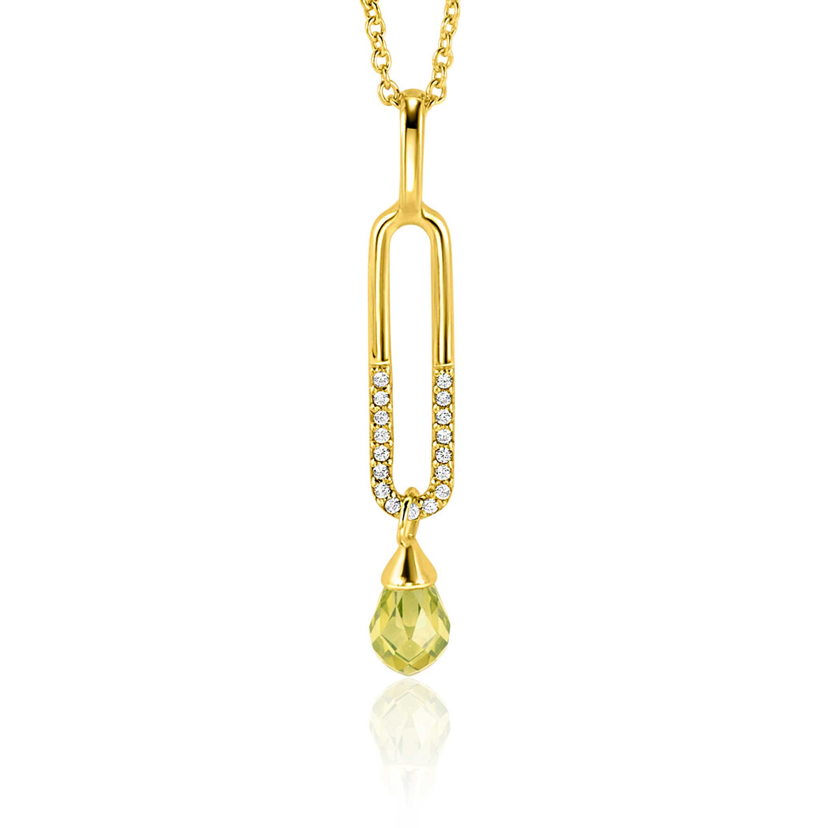 Pendentif doré en forme de trombone avec une pierre jaune et des zircons.