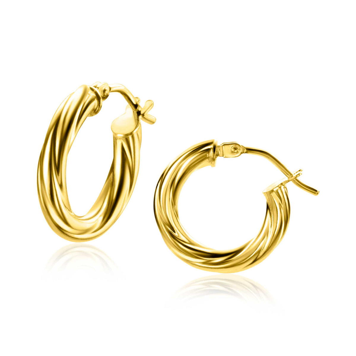 Boucles d'oreilles en or avec un design torsadé.