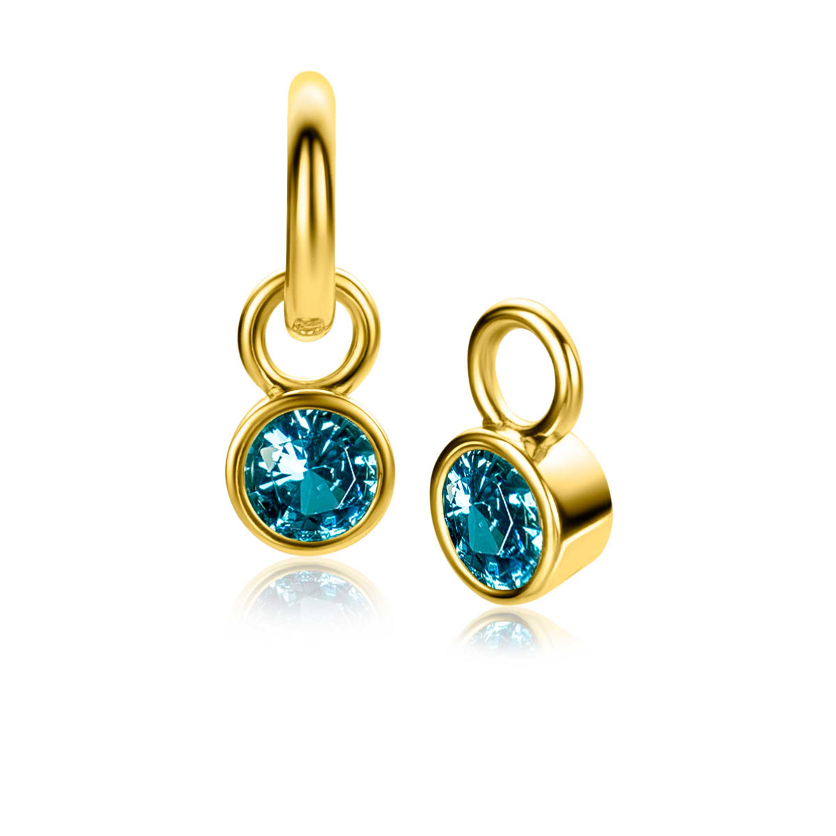 Boucles d'oreilles plaquées or avec un cristal bleu en forme ronde.