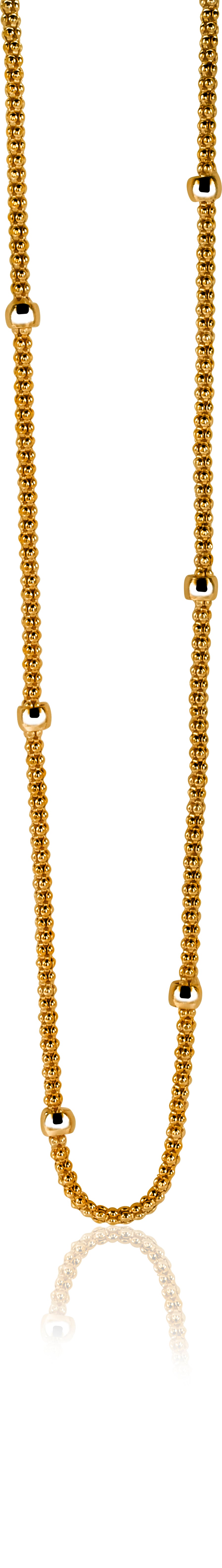 Collier doré avec des maillons ronds et des détails en forme de cercle.