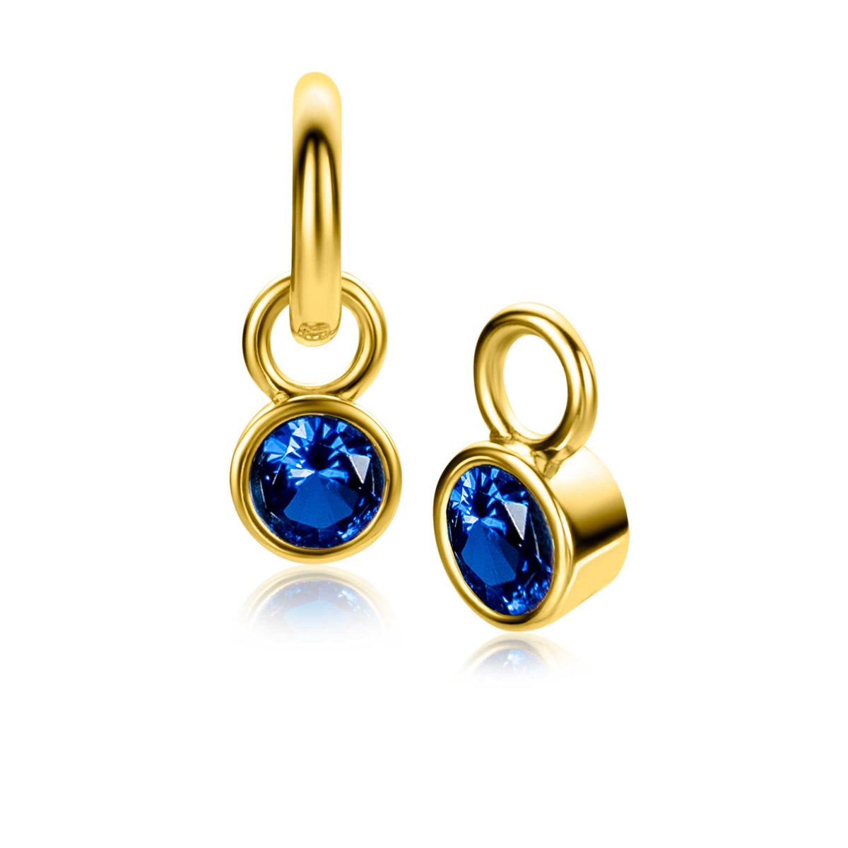Boucles d'oreilles dorées avec un cristal bleu en forme ronde.