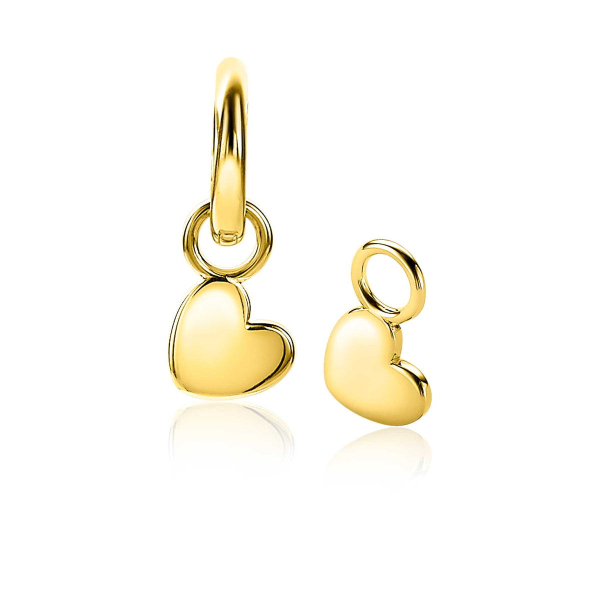 Boucles d'oreilles dorées en forme de cœur, avec un petit pendentif et un anneau.