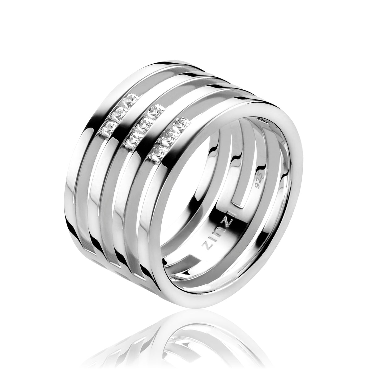 Bague en argent avec plusieurs bandes lisses et inscriptions discrètes.