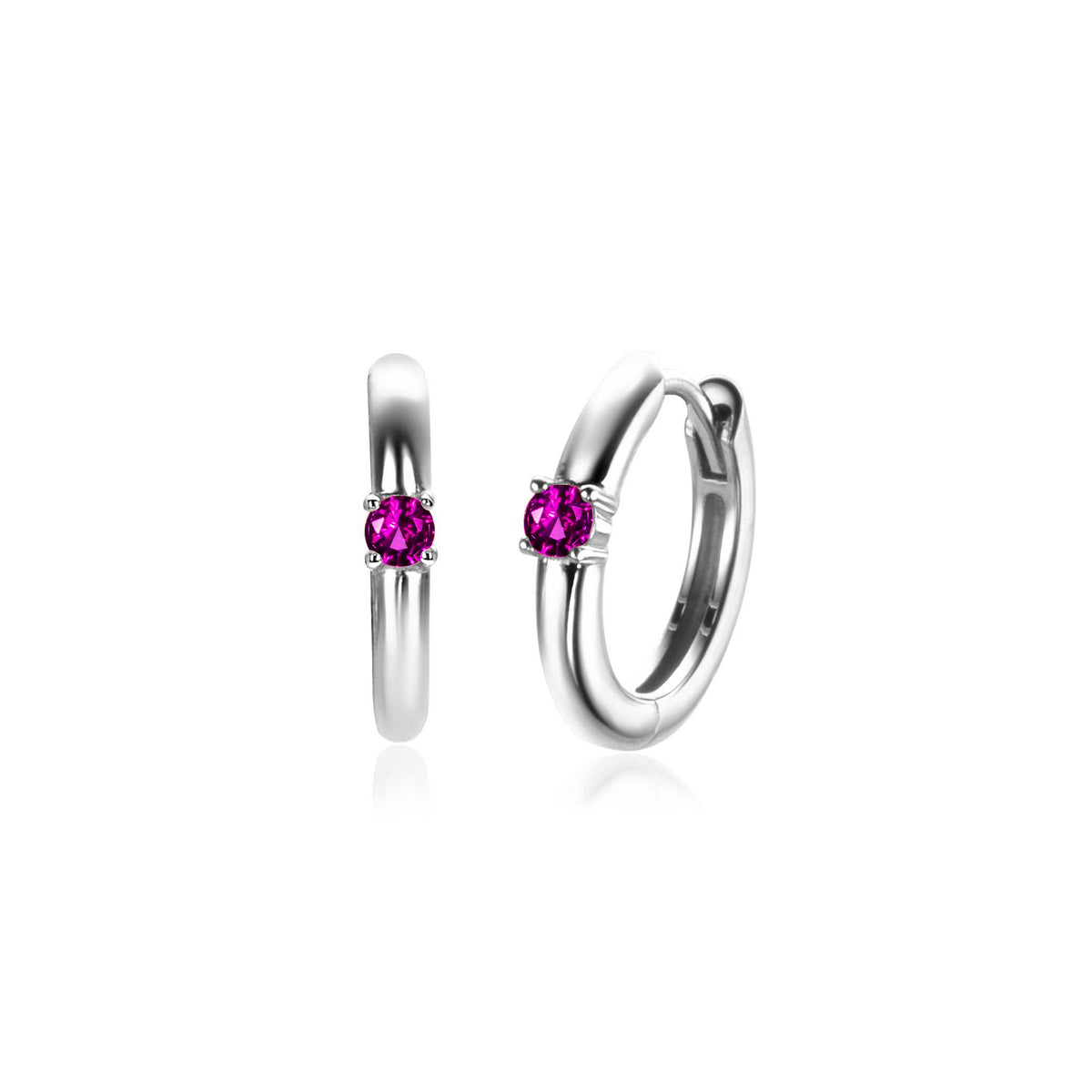 Boucles d'oreilles en argent avec un zircon rose brillant.