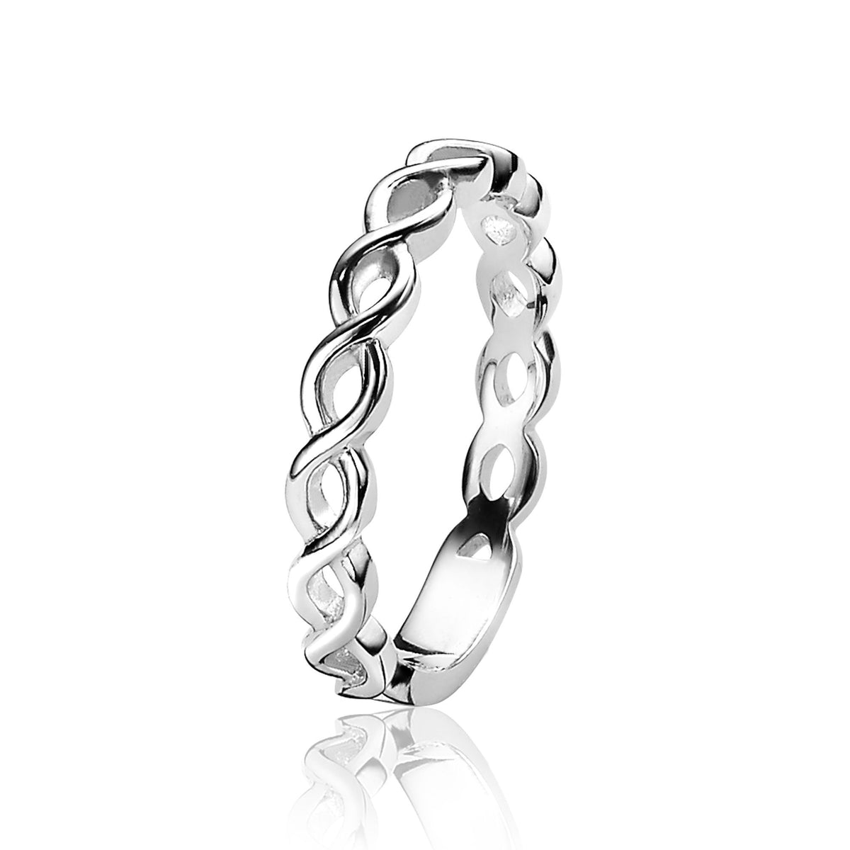 Bague en argent avec un design entrelacé et des formes ondulées.