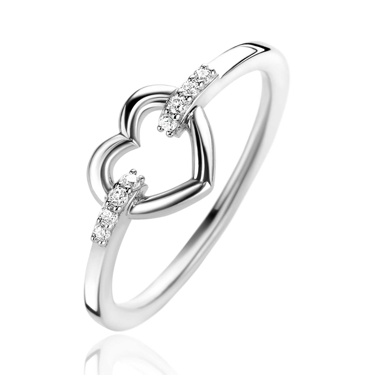 Bague en argent avec motif en forme de cœur et pierres scintillantes.