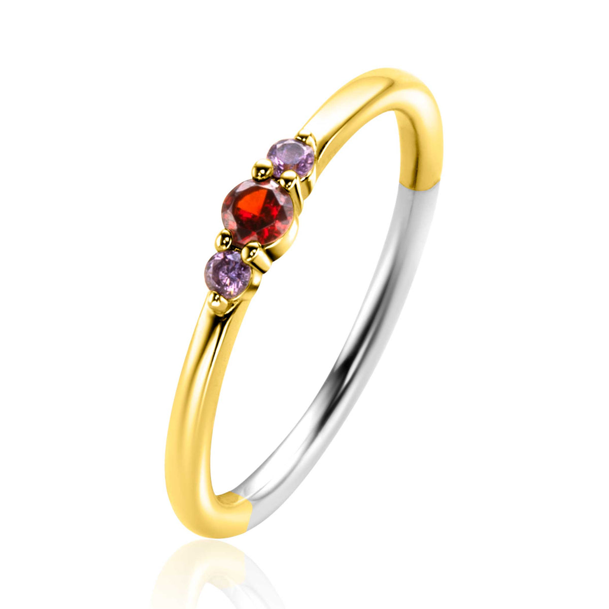 Bague plaquée or avec un cabochon rouge et deux pierres violettes.