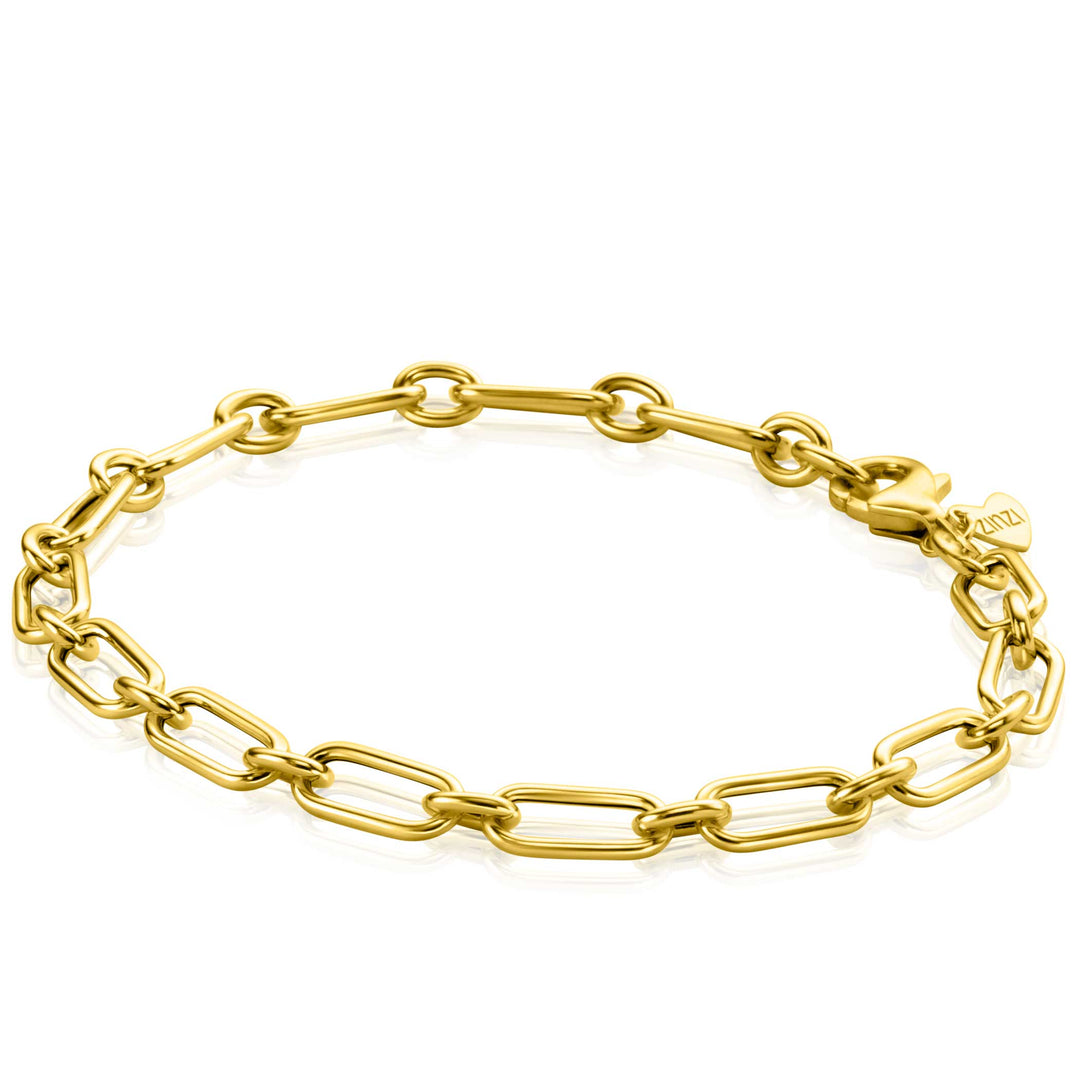 De Zinzi Armband Goud Zga354 is een elegante 14k gouden armband met gepolijste fantasie ovale schakels en een karabijnsluiting, compleet met een klein label bij de sluiting. Het is prachtig tentoongesteld op een witte achtergrond.