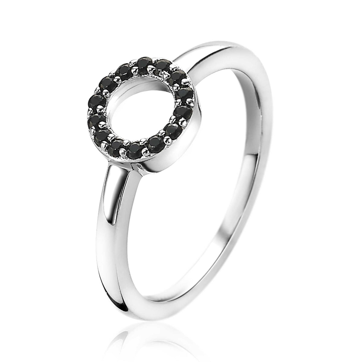 Bague en argent avec un cercle central orné de pierres noires.