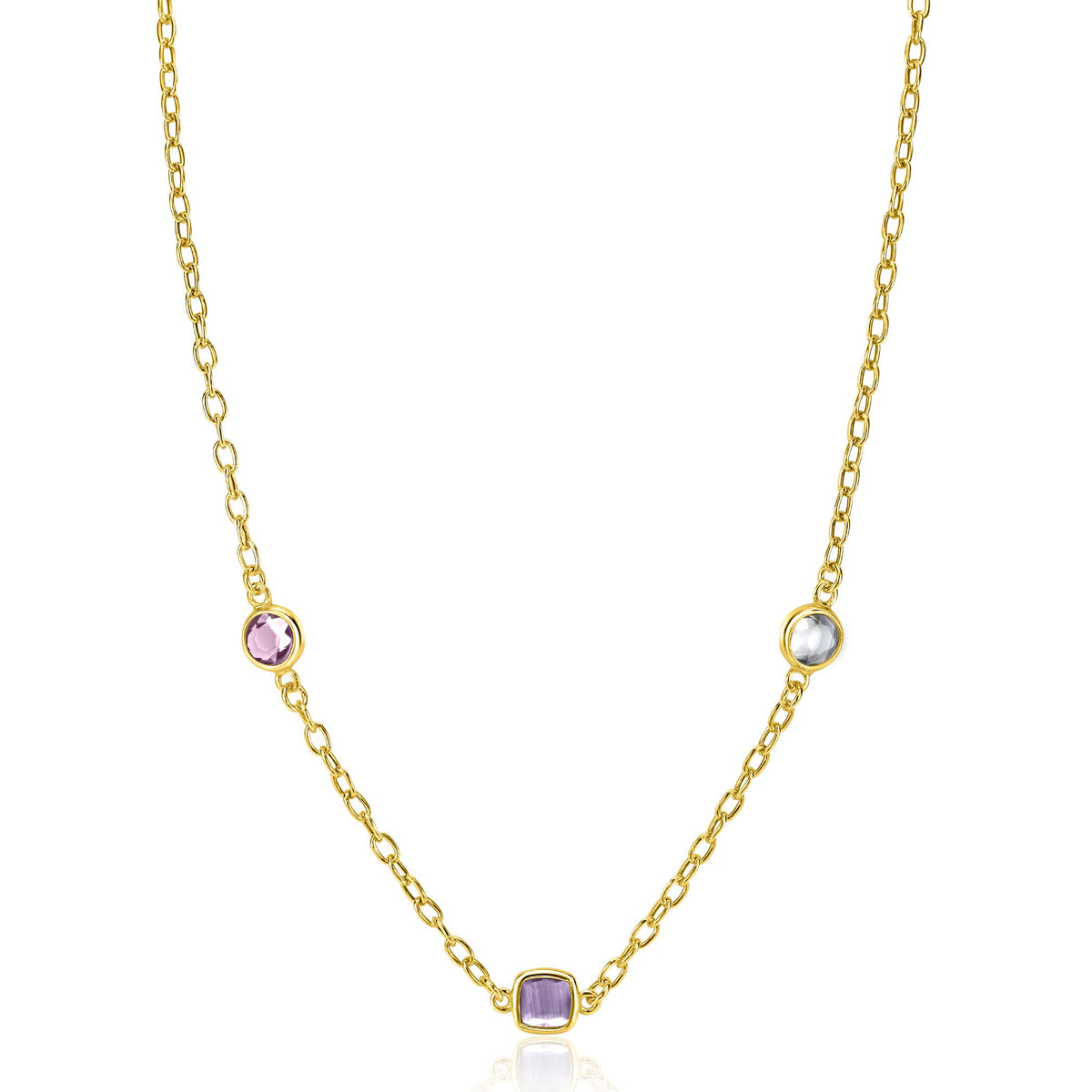 Collier doré avec trois pendentifs en pierres colorées.