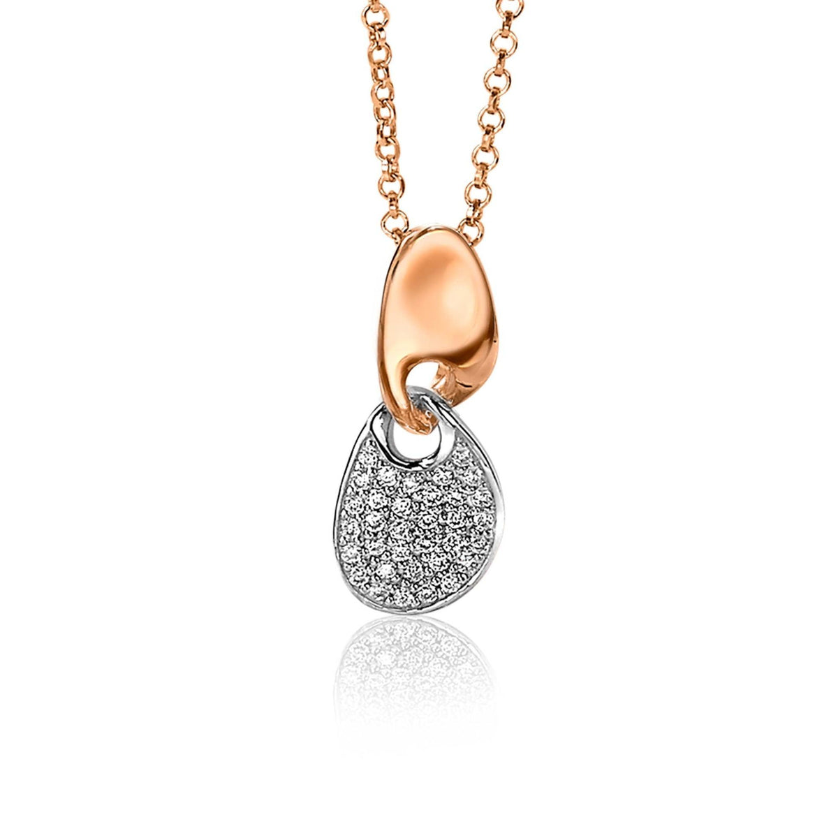 Pendentif doré avec un détail argenté et des pierres scintillantes, suspendu à une chaîne.