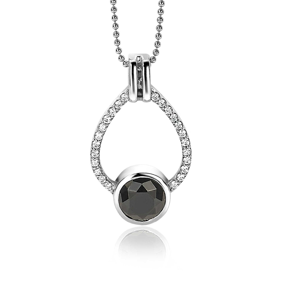 Pendentif en argent avec une pierre noire centrale et des zircons scintillants.