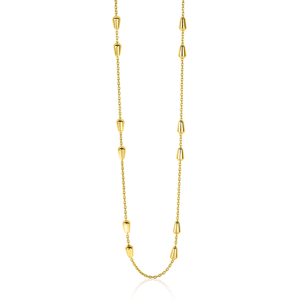 Collier doré avec des éléments en forme de goutte et une chaîne délicate.