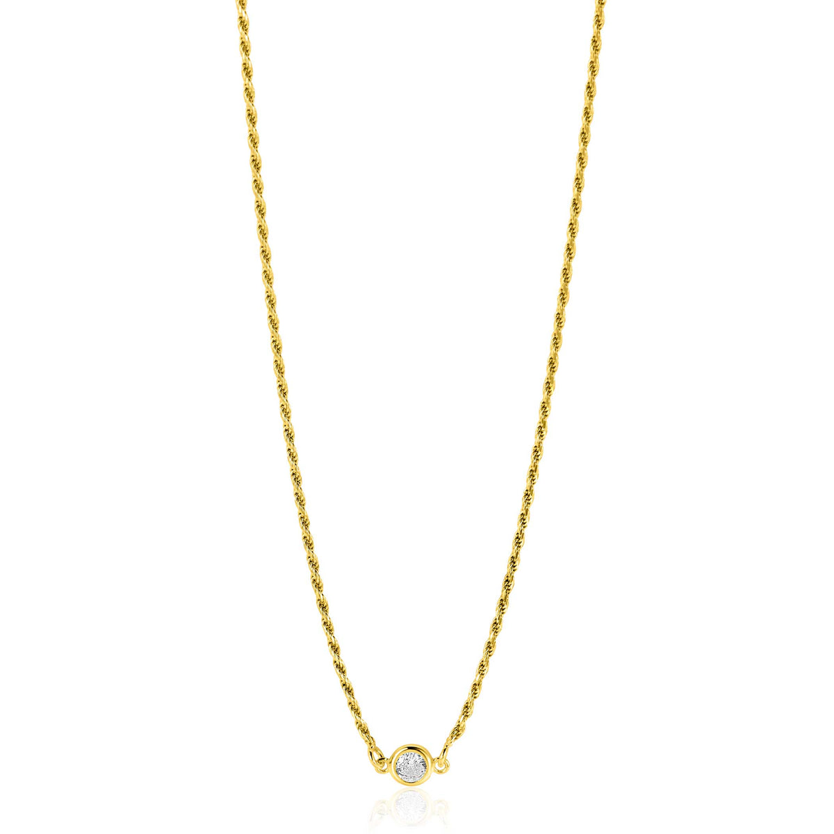 Collier doré avec une chaîne torsadée et un pendentif en cristal.