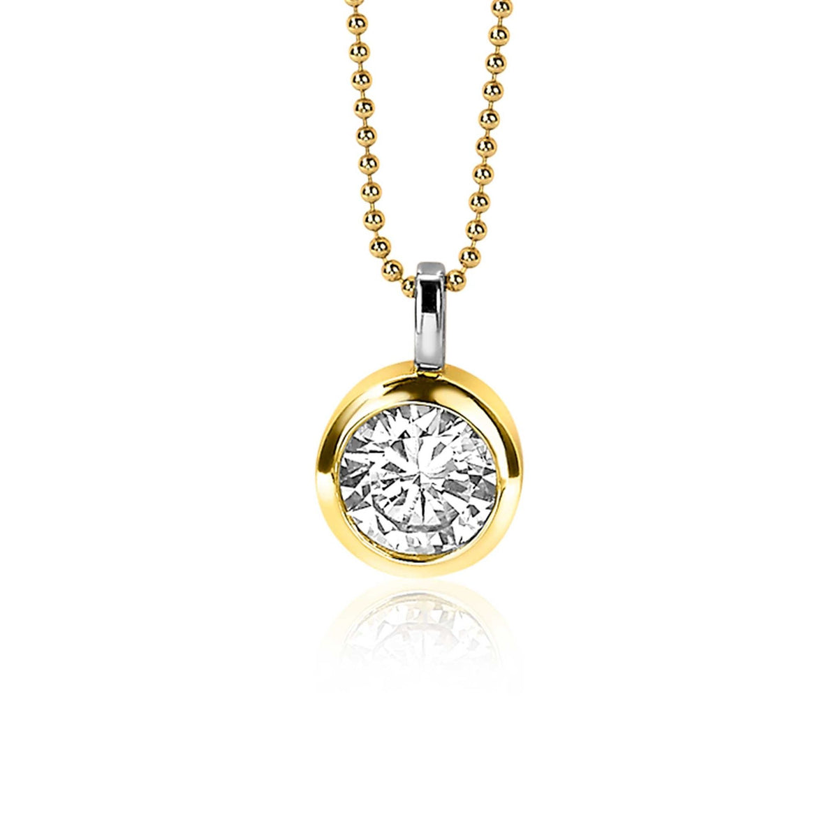 Pendentif doré avec un cristal transparent, suspendu à une chaîne à billes.
