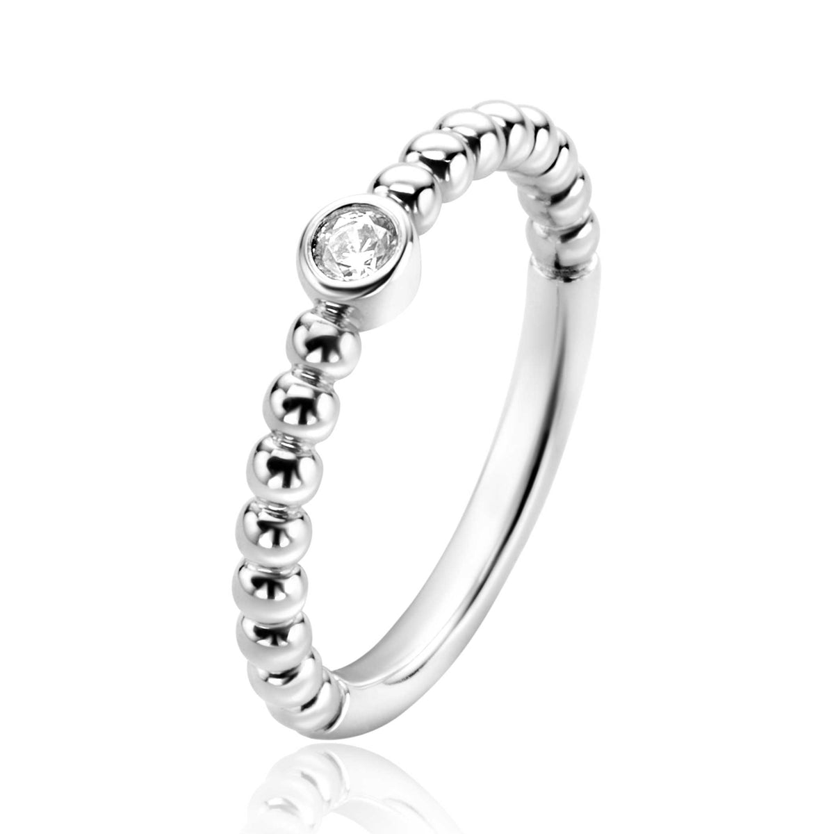 Bague en argent avec des perles et un zircon.