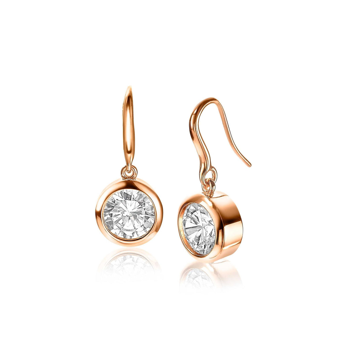 Boucles d'oreilles dorées avec un cristal transparent en forme ronde.