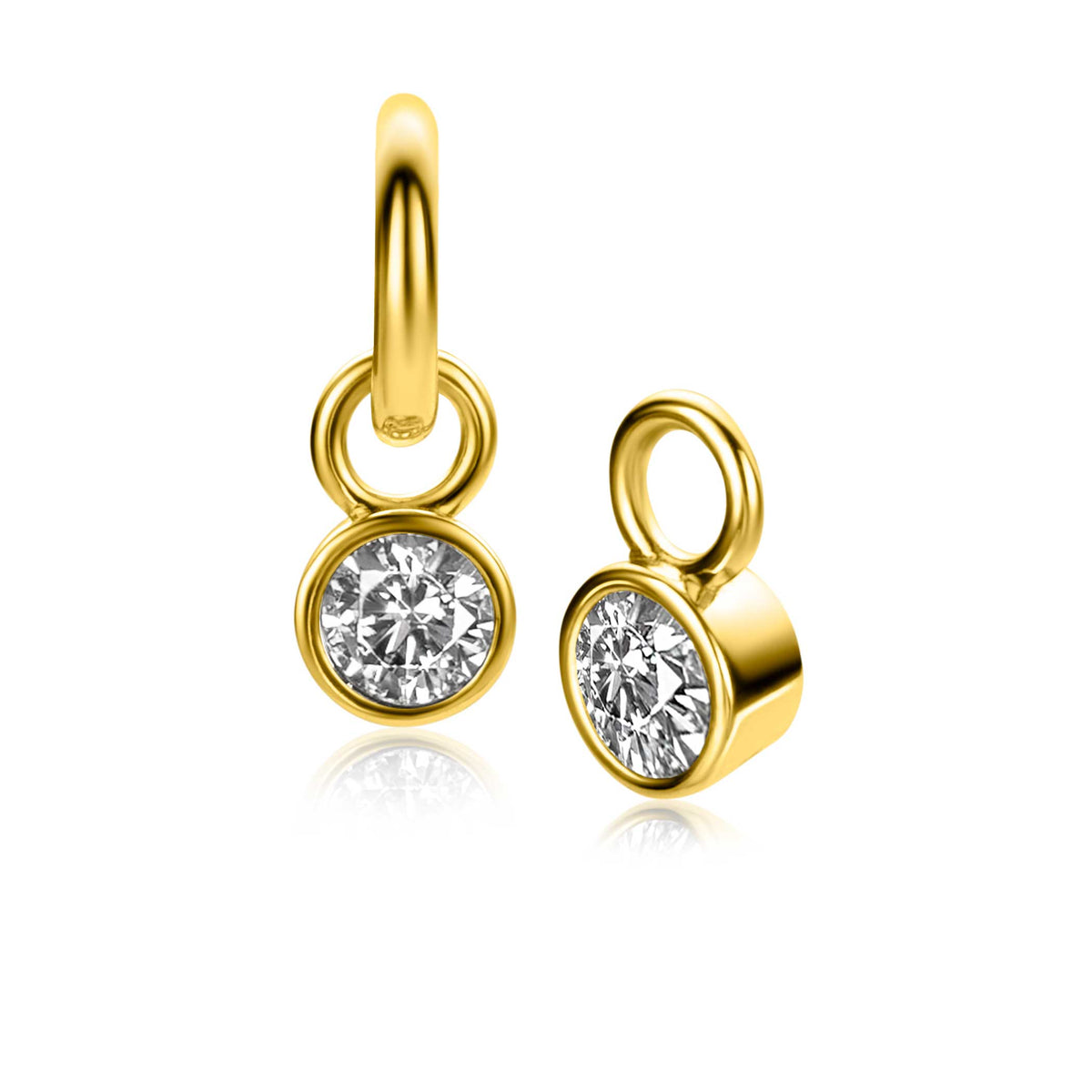 Boucles d'oreilles dorées avec un zircon serti, forme ronde et finition brillante.
