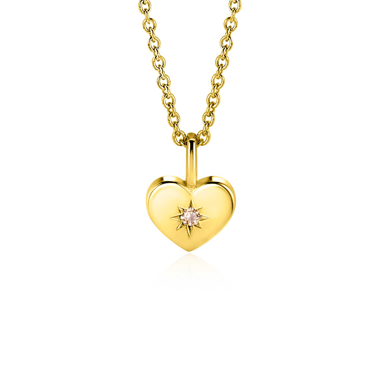 Pendentif en forme de cœur doré avec une pierre rose, suspendu à une chaîne.