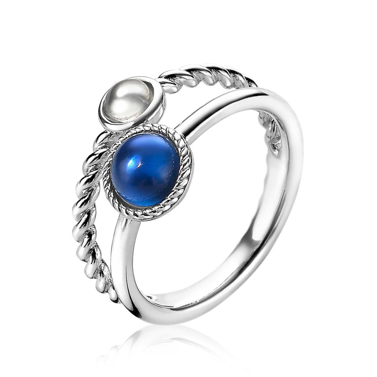 Bague en argent avec deux pierres, une bleue et une blanche, et un design tressé.