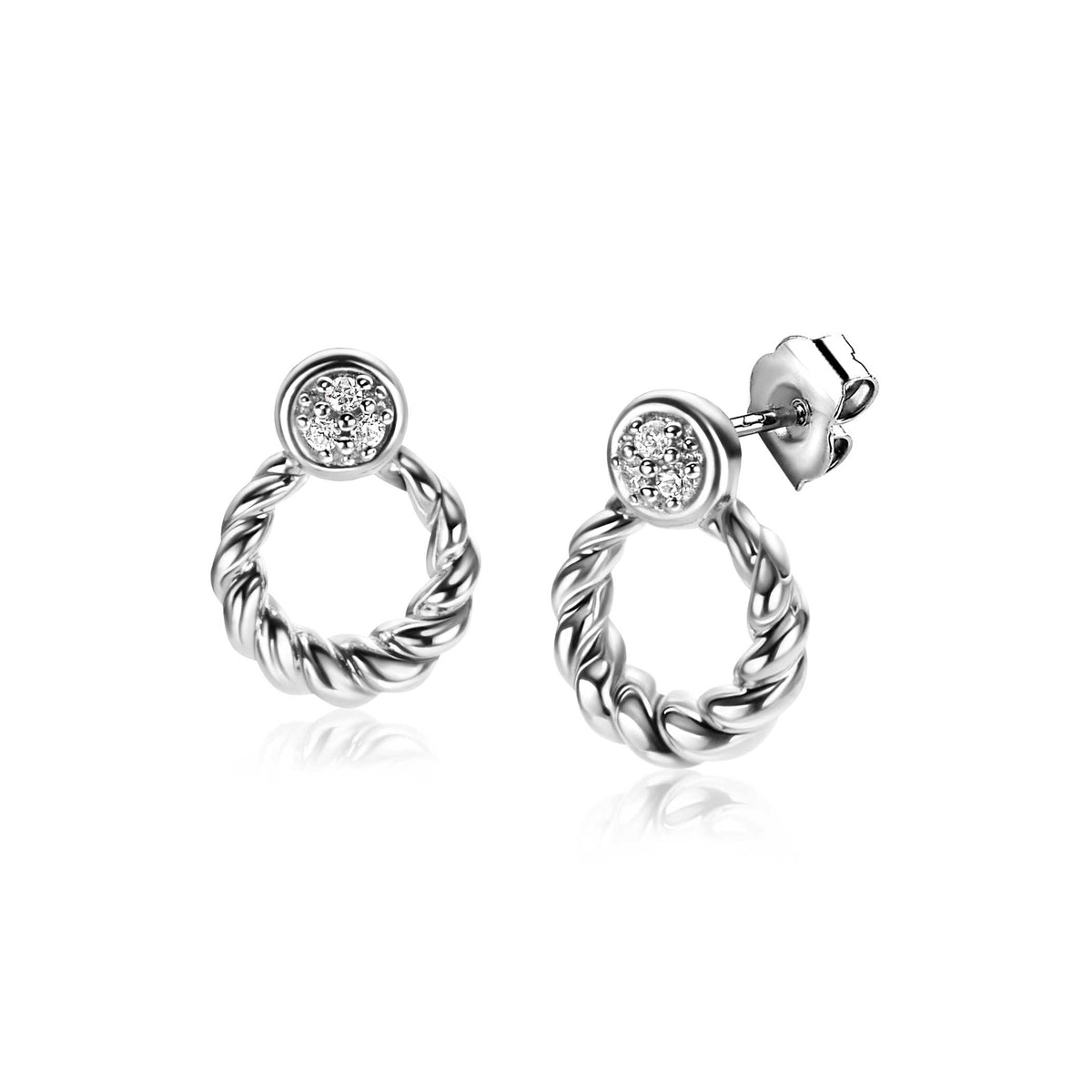 Boucles d'oreilles en argent avec un design torsadé et un zircon scintillant.