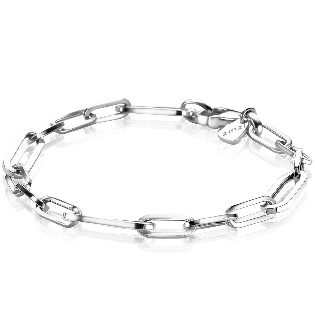 Ontdek de Zinzi Armband Zilver Zia1990, een strakke zilveren schakelarmband met langwerpige rechthoekige schakels die lijken op eeuwig gesloten schakels en een ronde gravure bij de sluiting, gepresenteerd op een onberispelijk witte achtergrond.