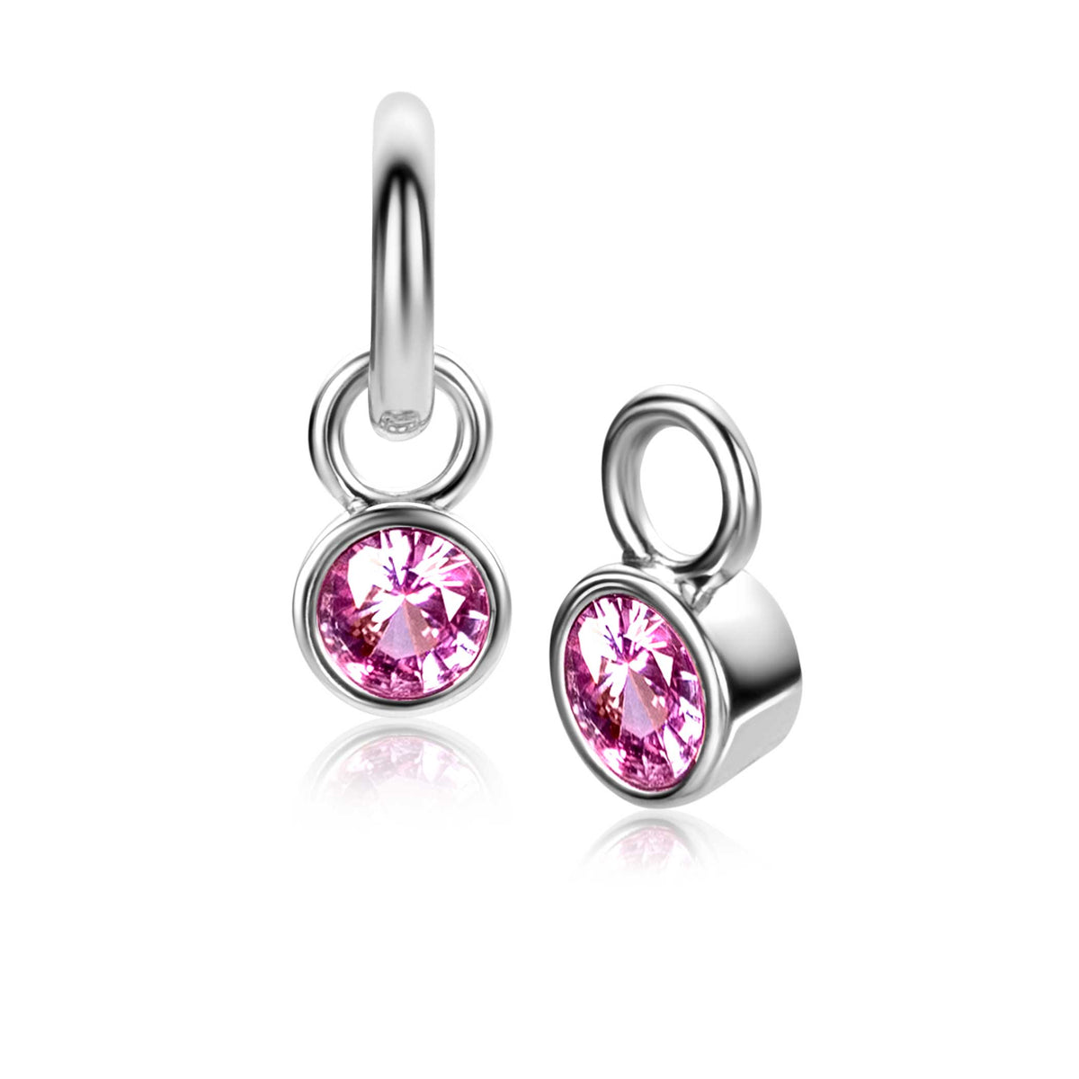 Boucles d'oreilles en argent avec des pierres roses scintillantes.
