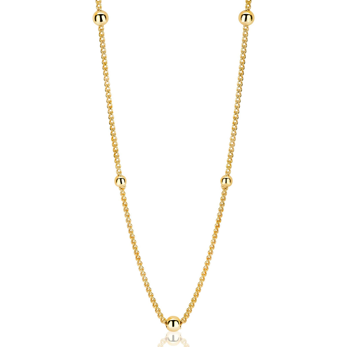 Collier doré avec des perles rondes, chaîne délicate et finition brillante.