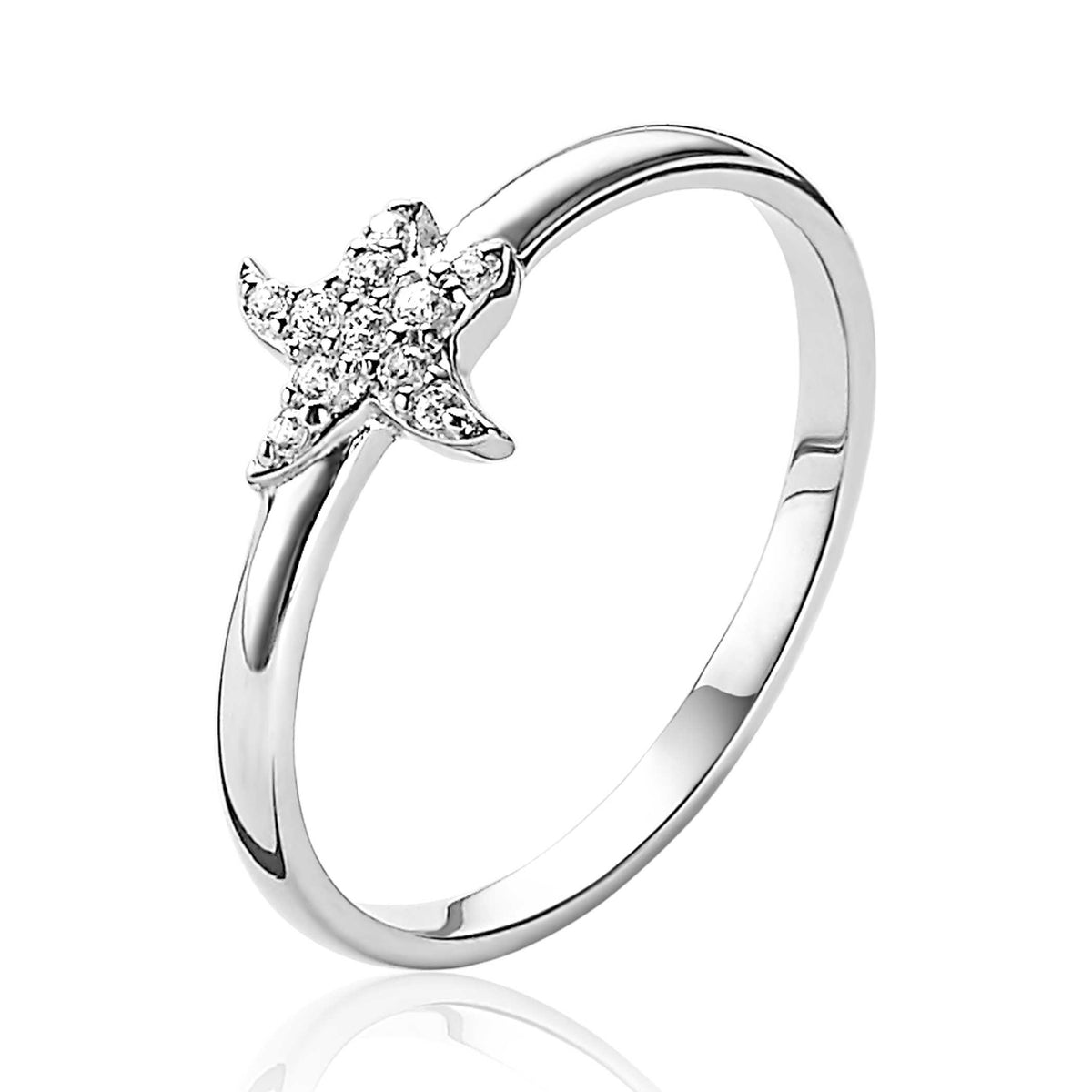 Bague en argent avec motif étoile et pierres brillantes.