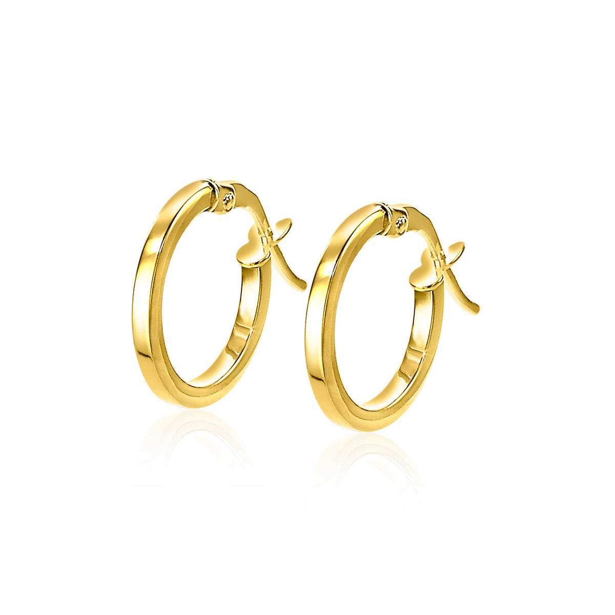 Boucles d'oreilles en or, de forme ronde et lisse, avec un fermoir délicat.