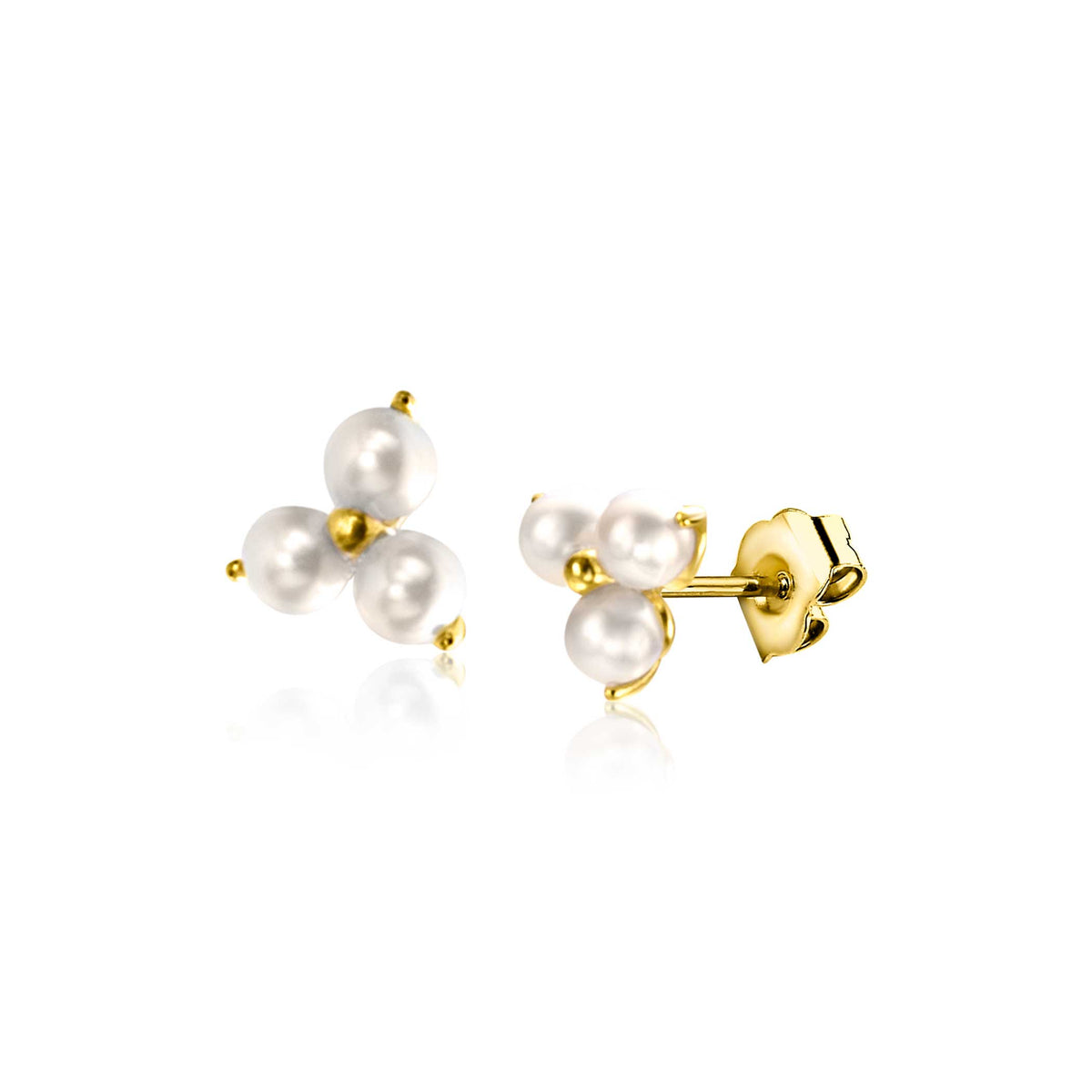 Boucles d'oreilles en or avec trois perles blanches.