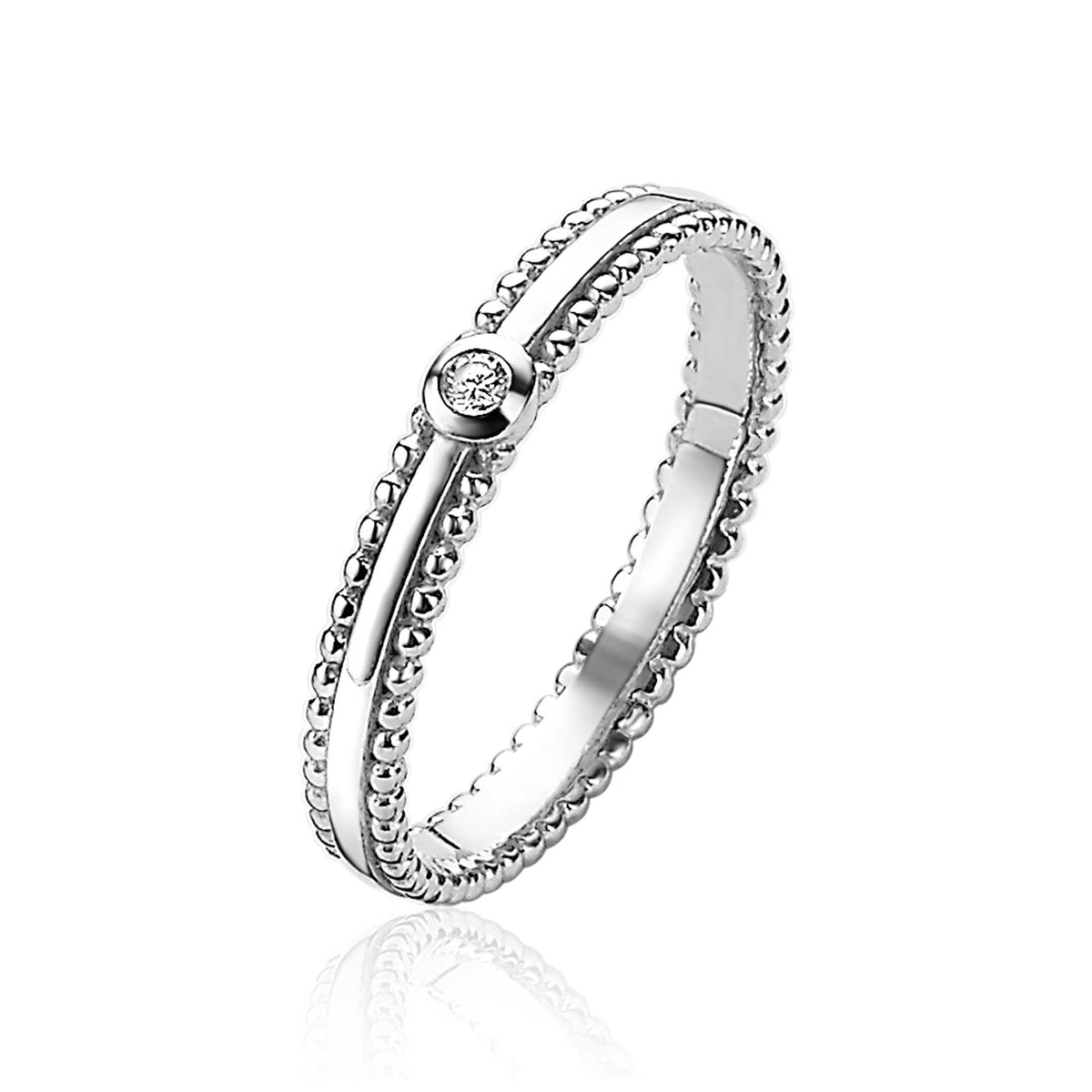 Bague en argent avec un détail en forme de perles et un petit zircon.