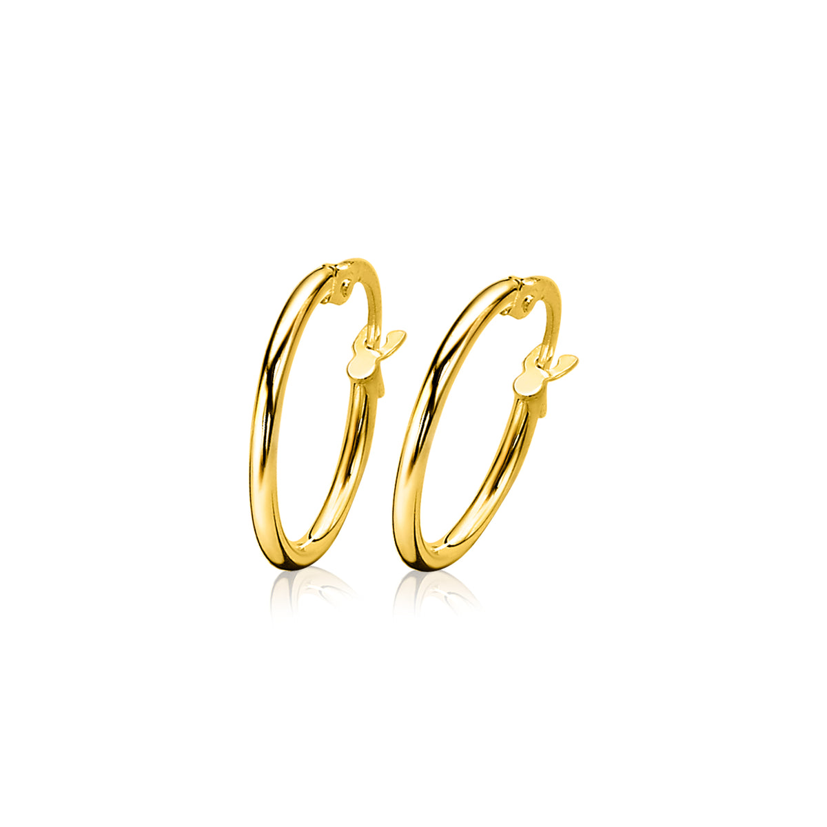 Boucles d'oreilles en or avec un design simple et élégant, présentant une petite finition en forme de cœur.