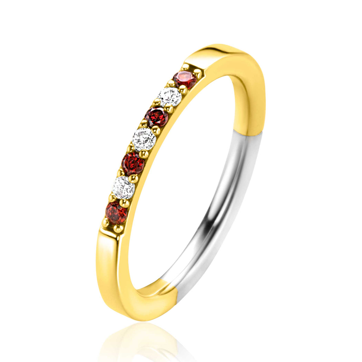 Bague dorée avec des pierres rouges et blanches serties sur le dessus.