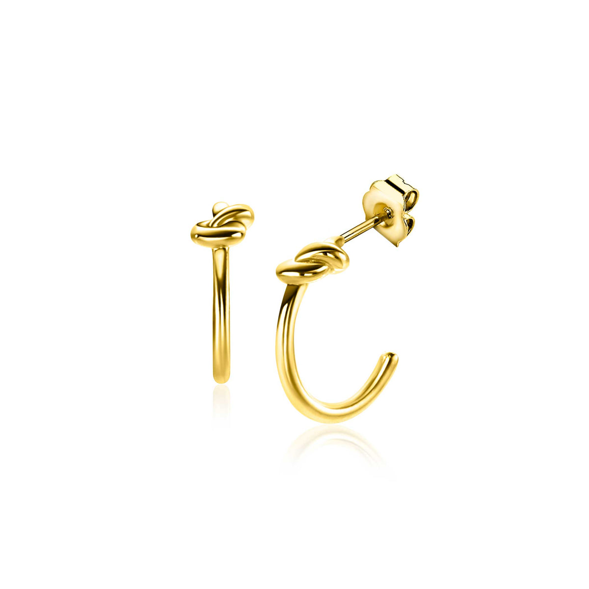 Boucles d'oreilles en or avec un design en forme de nœud.