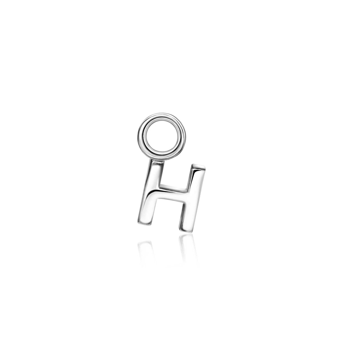 Boucle d'oreille en argent en forme de lettre H avec un cercle.